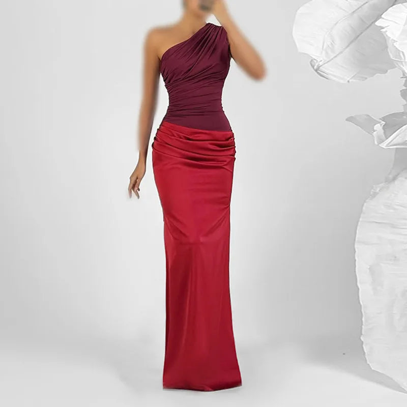 One-shoulder burgundy and red evening gown on a white background