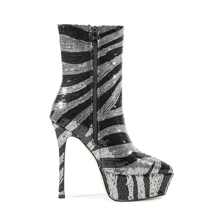 Black and silver striped high-heeled boot on a white background