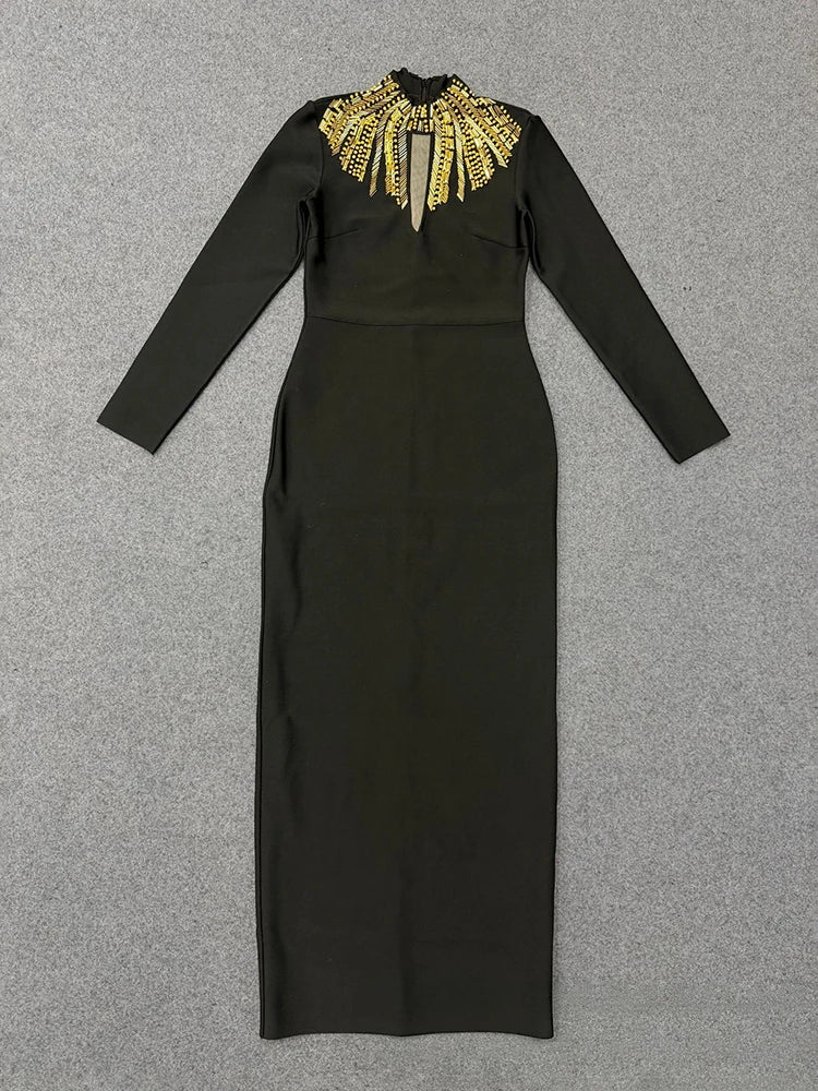 Flat lay of embellished neck long sleeve black maxi dress