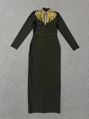 Flat lay of embellished neck long sleeve black maxi dress