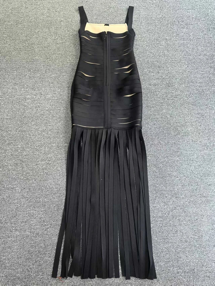 Black fringe dress on a gray background
