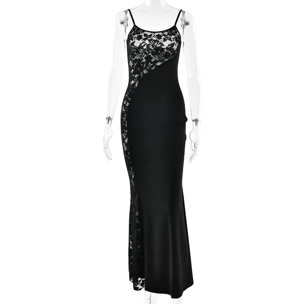 Black evening gown with floral lace detailing on a white background