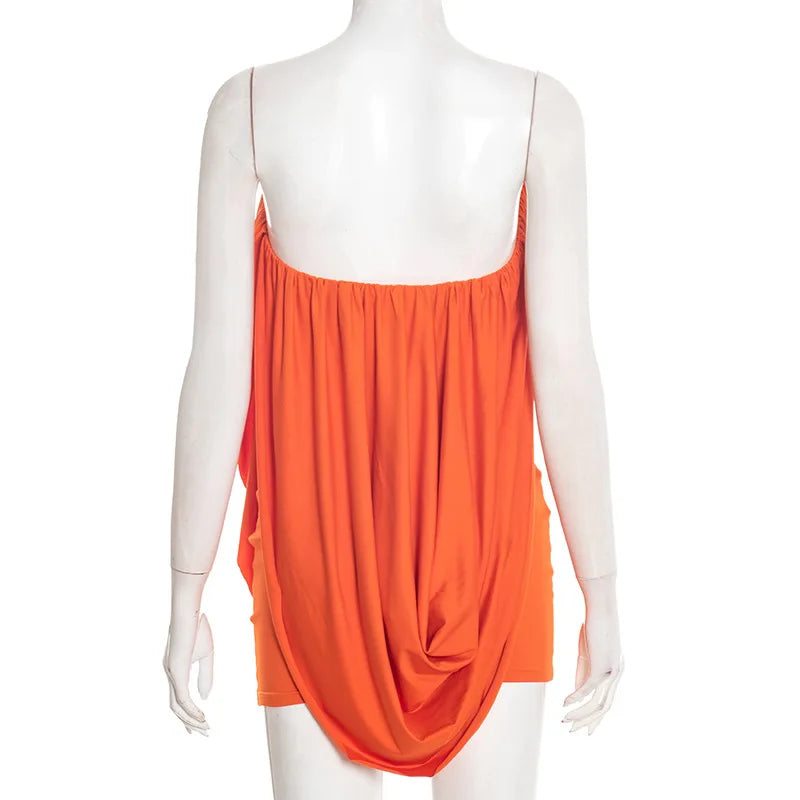 Orange sleeveless top on a white mannequin against a white background