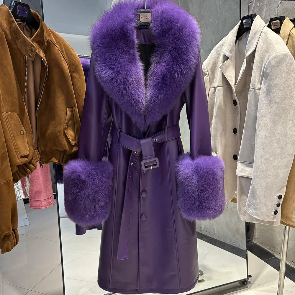 Purple coat with fur trim displayed in a store setting