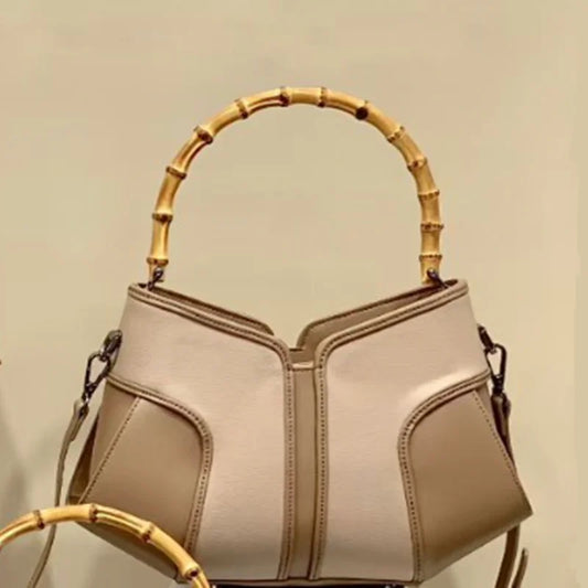 Bamboo handle colorblock leather handbag