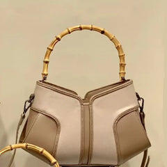 Bamboo handle colorblock leather handbag