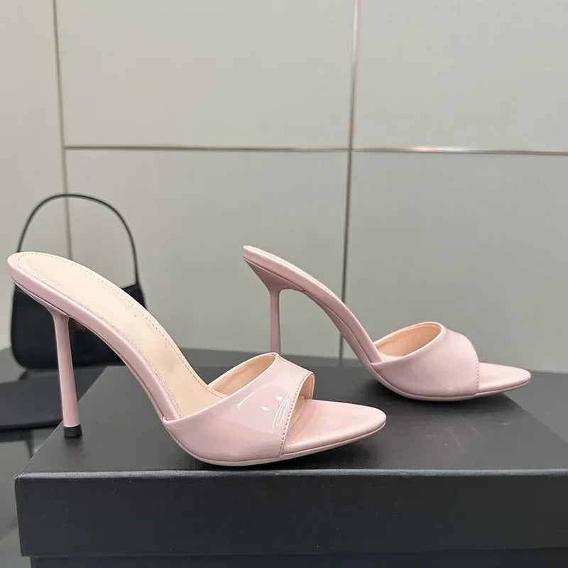 Pale pink patent pointed toe stiletto heels