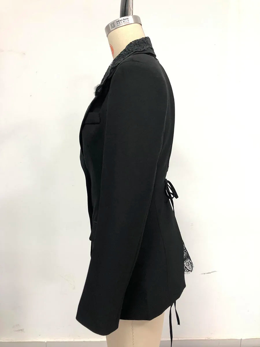Black blazer on a mannequin against a white background