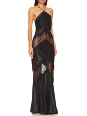 Black lace evening gown on a white background