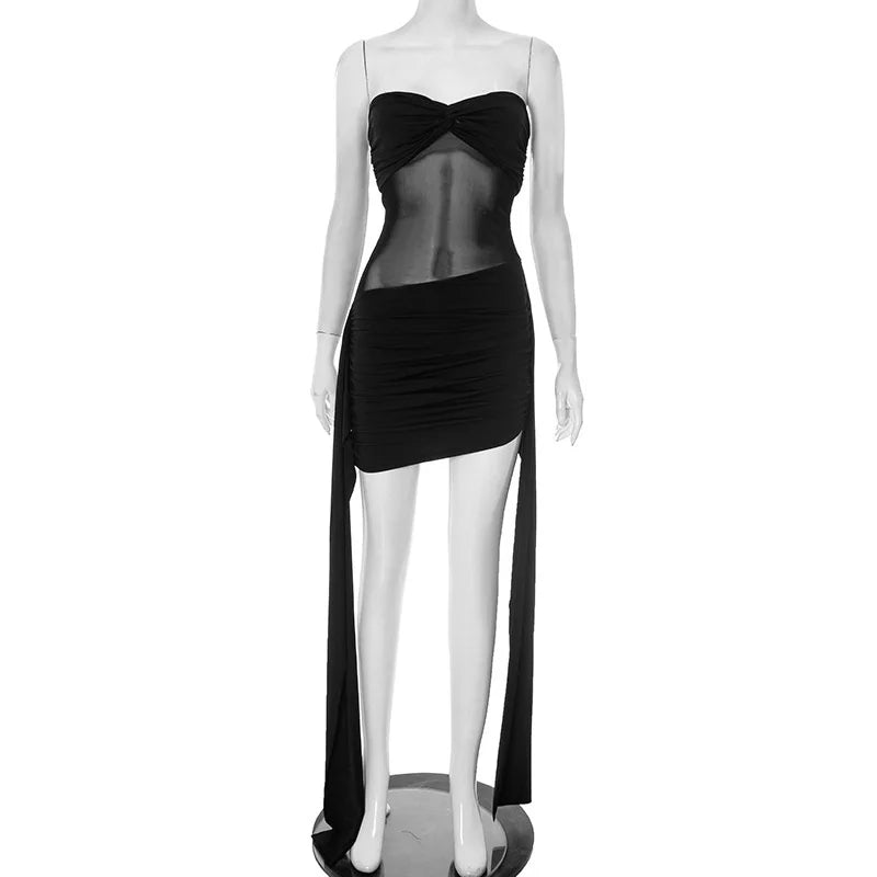Black dress with sheer overlay on a mannequin against a white background