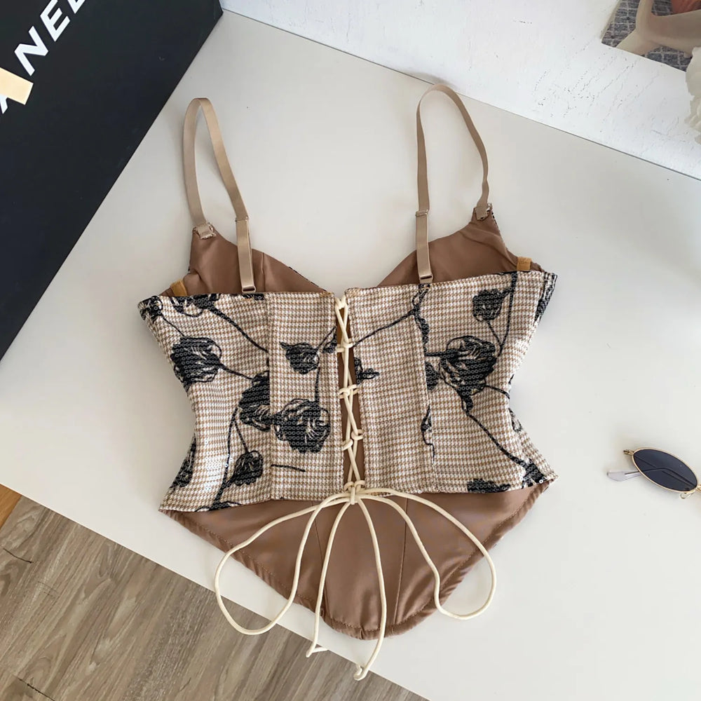 Back view of floral print corset top with lace-up closure