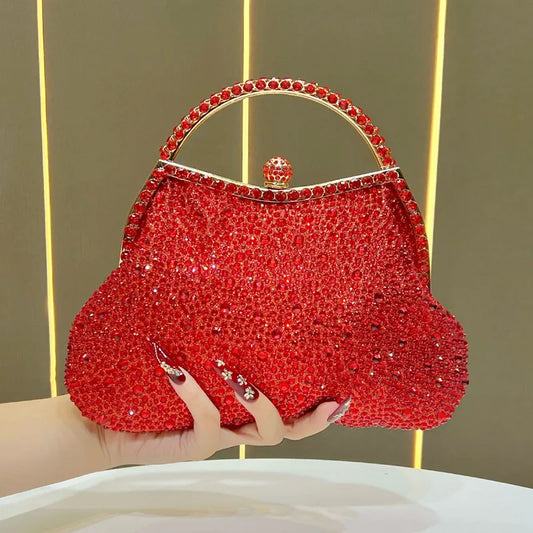 Red crystal-encrusted top handle clutch bag