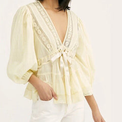 Cream puff sleeve lace trim peplum top with cream tie