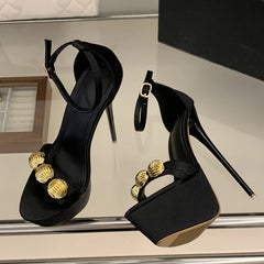 Angle view of platform stiletto sandal with embellished strap