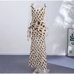 Polka dot maxi dress displayed on a mannequin