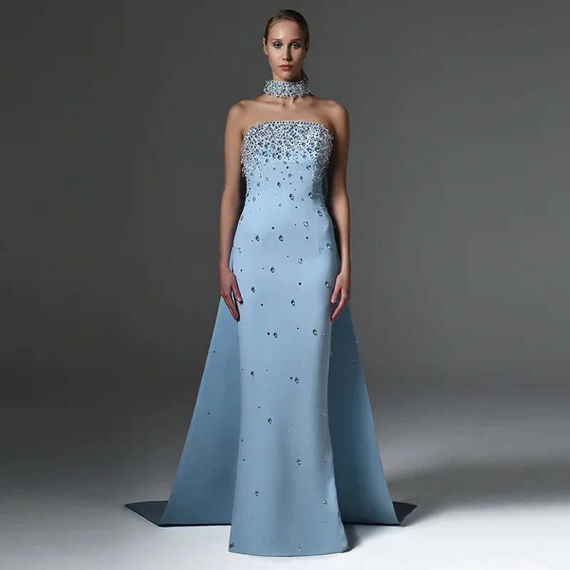 Strapless long gown with diamond embellishments and detachable cape front view.