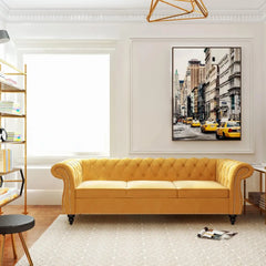 Yellow sofa in a stylish living room with a cityscape painting on the wall.