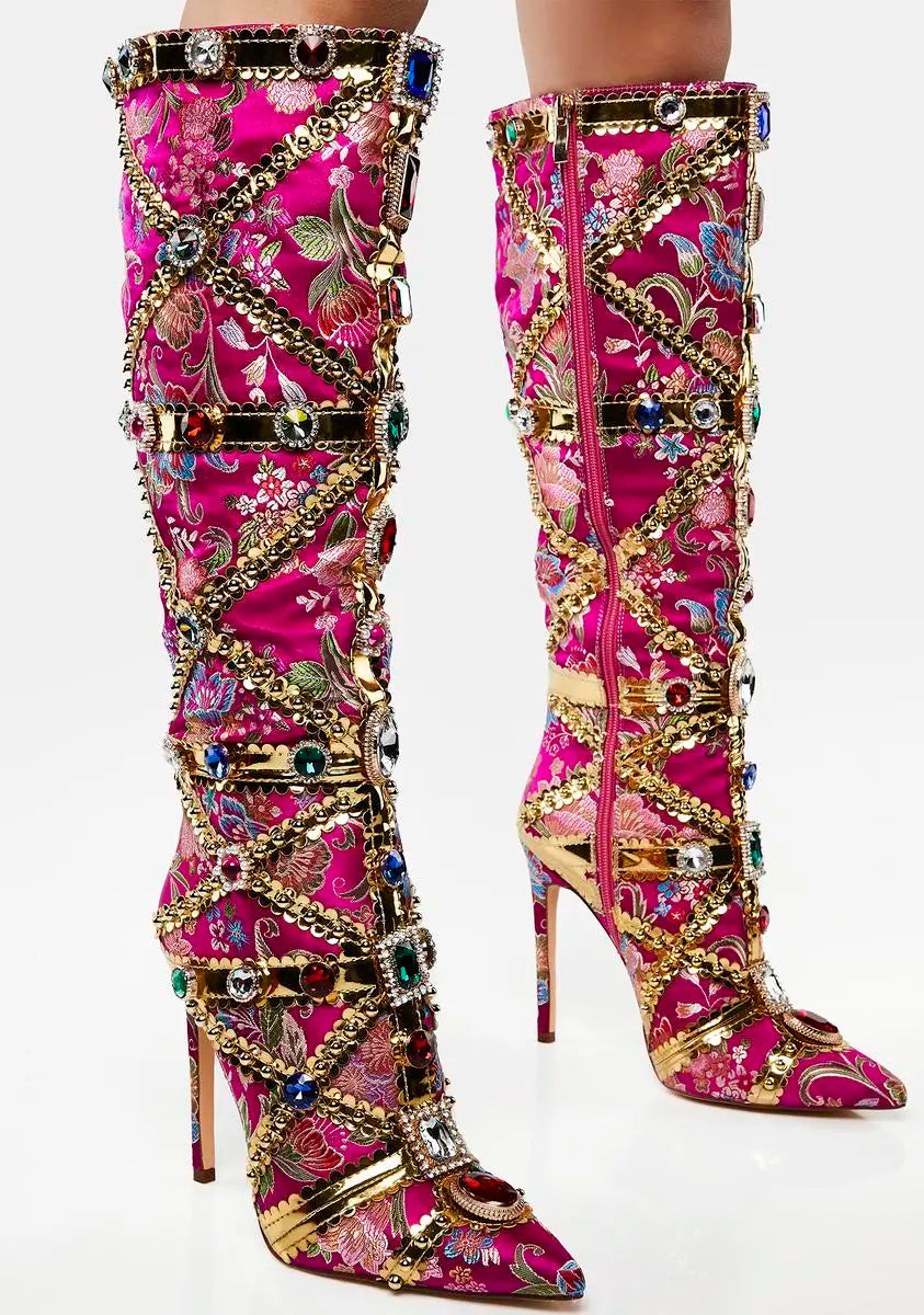 Decorative pink knee-high boots with gold and multicolor embellishments 
