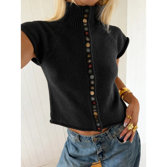 Black knit turtleneck crop top with colorful buttons