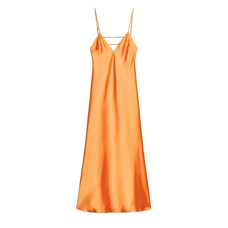 Orange slip dress on a white background