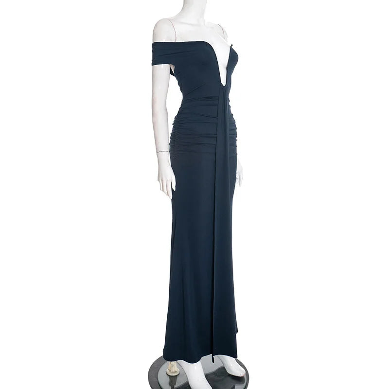 Navy blue off-shoulder evening gown on a mannequin against a white background