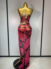 Back view of strapless maxi dress with butterfly print and rhinestone embellishments.
