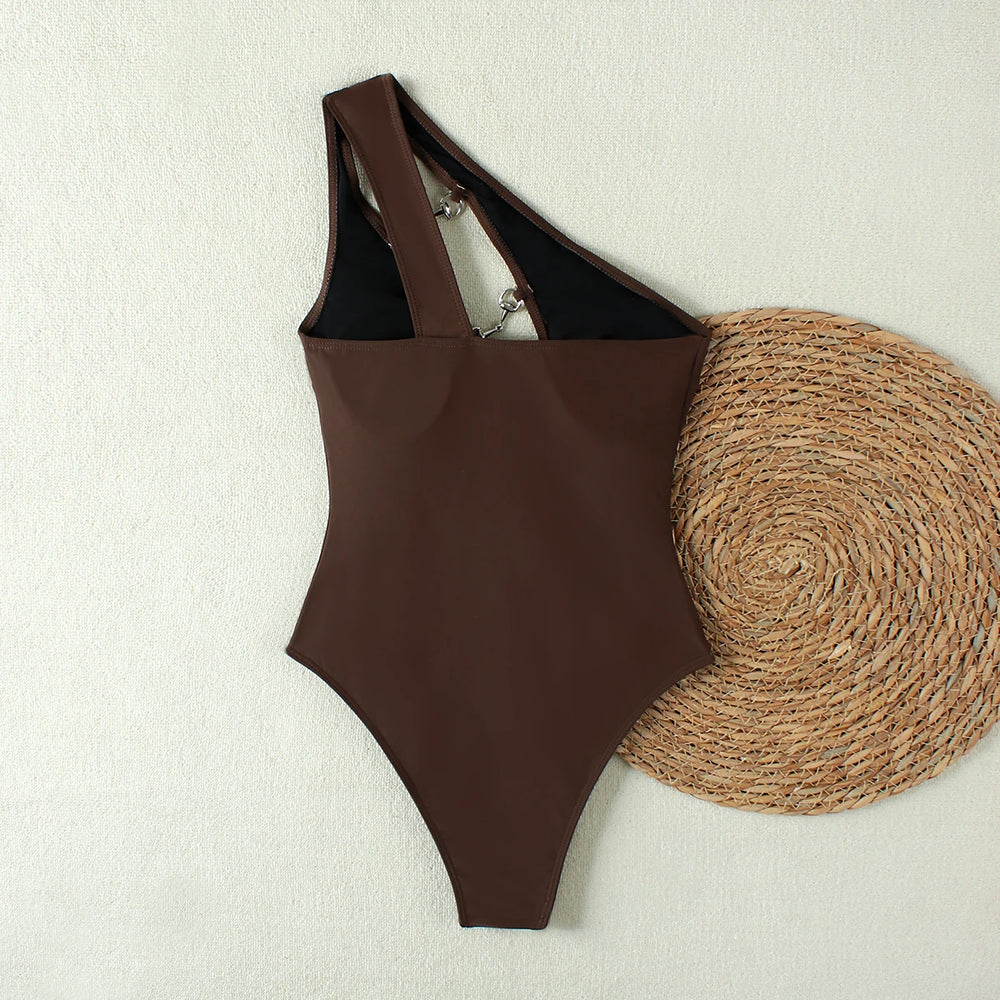 Back view of a one shoulder cut-out one-piece swimsuit
