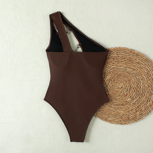 Back view of a one shoulder cut-out one-piece swimsuit