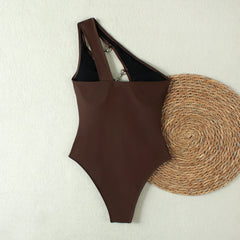 Back view of a one shoulder cut-out one-piece swimsuit
