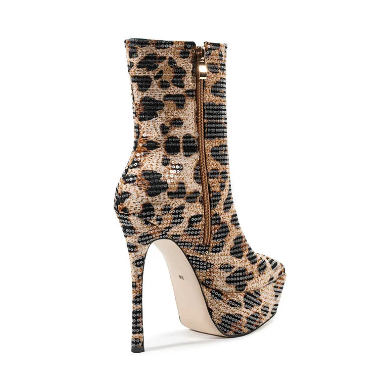 Leopard print high-heeled boot with a zipper on a white background