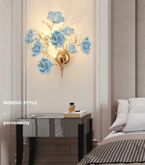 Wall-mounted light fixture with floral design in a bedroom setting