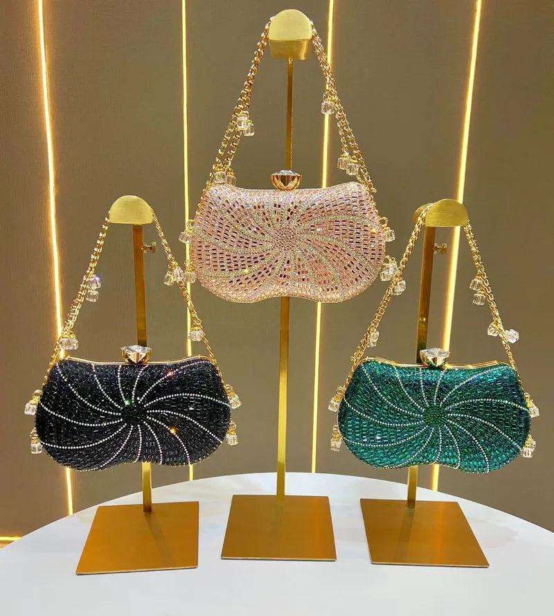 Collection of three sunburst beaded clutch bags