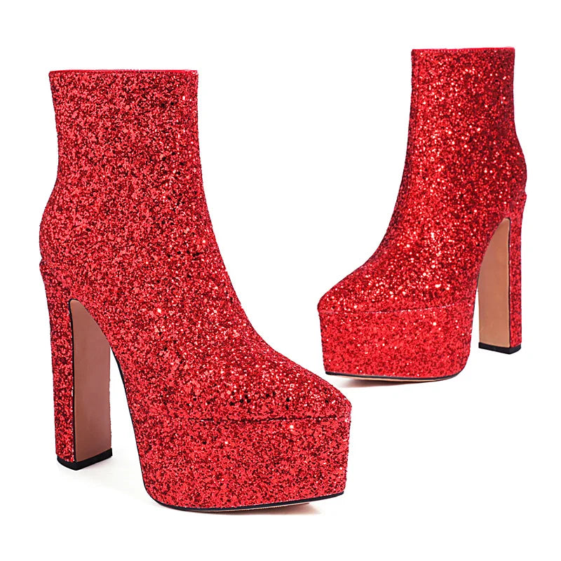 Red glitter platform boots on a white background
