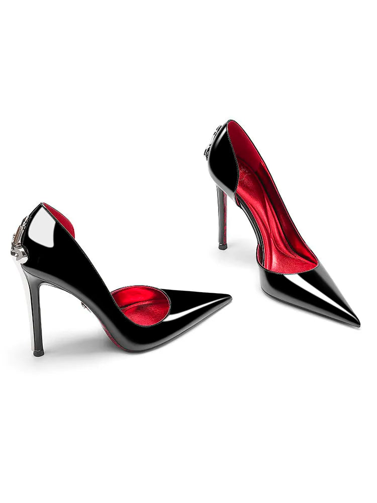 Black and red high-heeled shoes on a white background