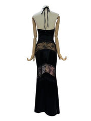 Black evening gown with lace detailing on a mannequin against a white background