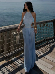 Light blue halter neck beaded cutout maxi dress by the water
