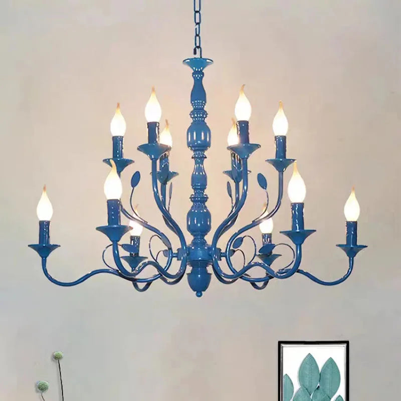 Blue chandelier with multiple lights on a plain wall