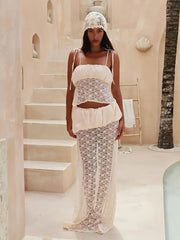 Ruched satin camisole with spaghetti straps and a sheer lace maxi skirt.