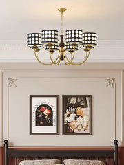 A retro-inspired polka dot chandelier with a minimalist design, hanging in a modern living room.