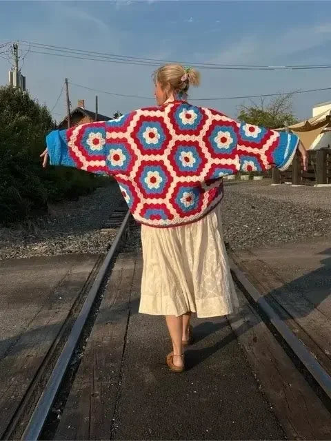 Back view of a geometric quilted kimono jacket.