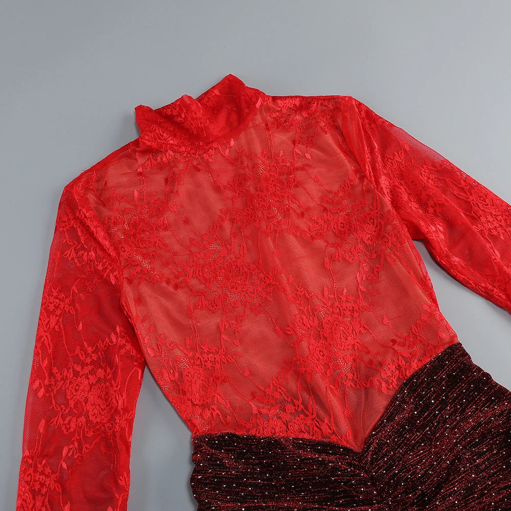 Red lace top with long sleeves on a gray background