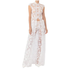 White lace sleeveless mock neck top and wide leg pants suit on mannequin