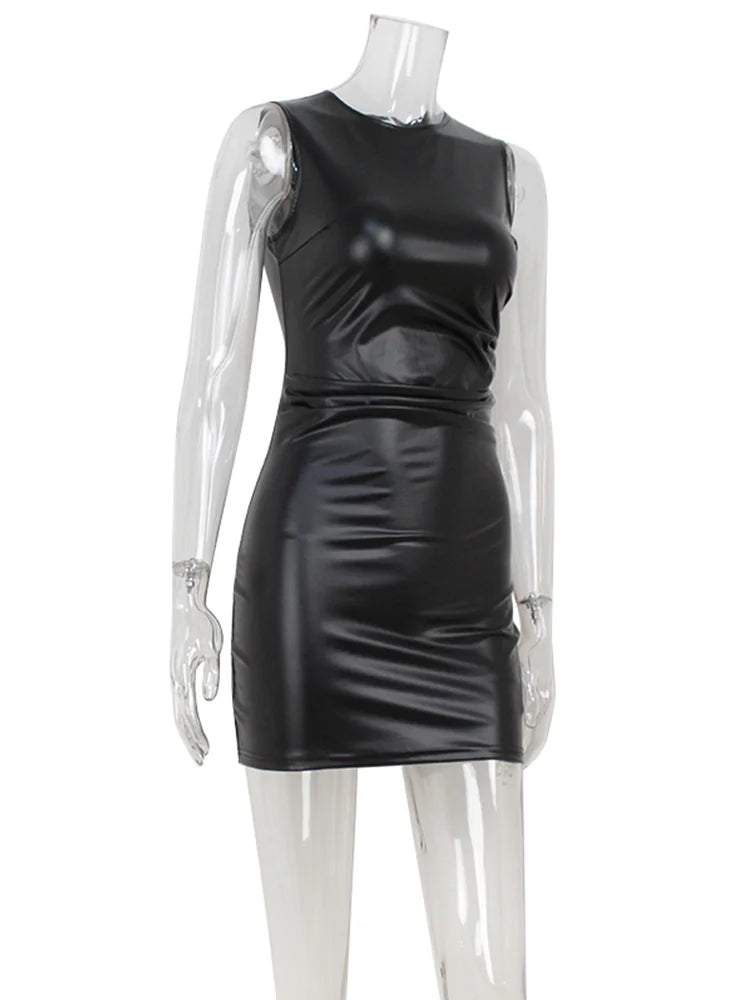 Black leather dress on a mannequin against a white background