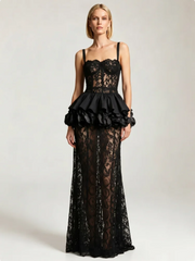 Model wearing a black lace peplum maxi dress
