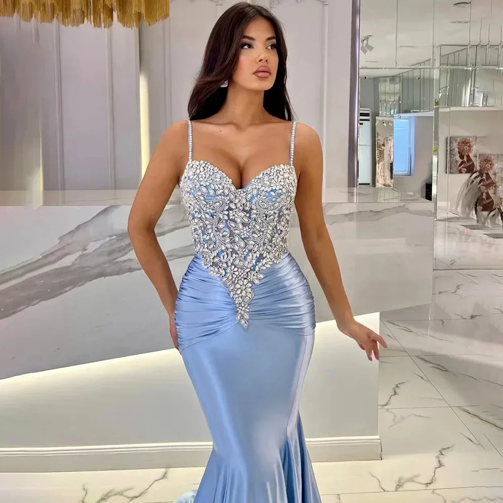 Blue satin beaded mermaid evening gown with sweetheart neckline and spaghetti straps