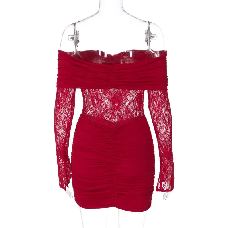 Red lace dress on a mannequin with a white background