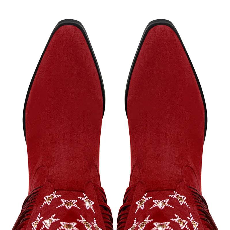 Top view of the pointed toe detail on red fringe western boots.