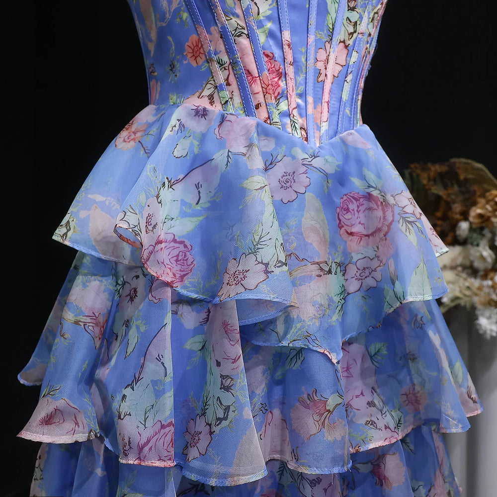 Blue floral dress with a black background