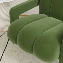 Close-up of a cushioned armchair showcasing its premium fabric and comfortable design. B