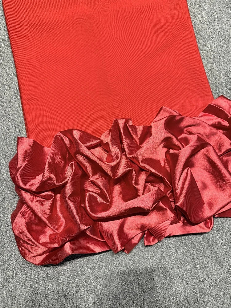 Red textured fabric on a gray surface